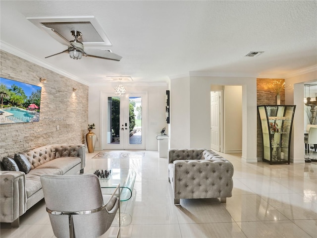 tiled living room featuring french doors, ornamental molding, a textured ceiling, and ceiling fan