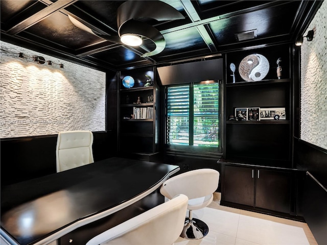 interior space featuring toilet, coffered ceiling, and tile patterned floors