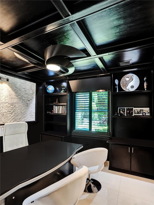 tiled home theater featuring coffered ceiling