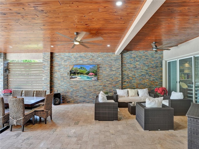 view of patio featuring outdoor lounge area and ceiling fan