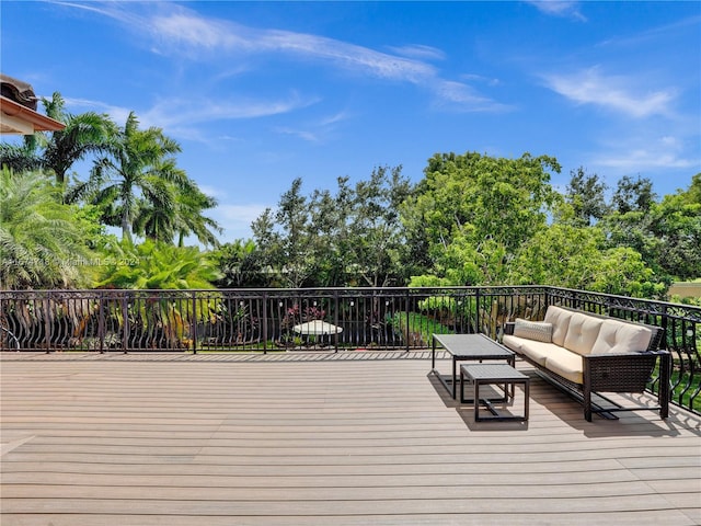 wooden deck with outdoor lounge area