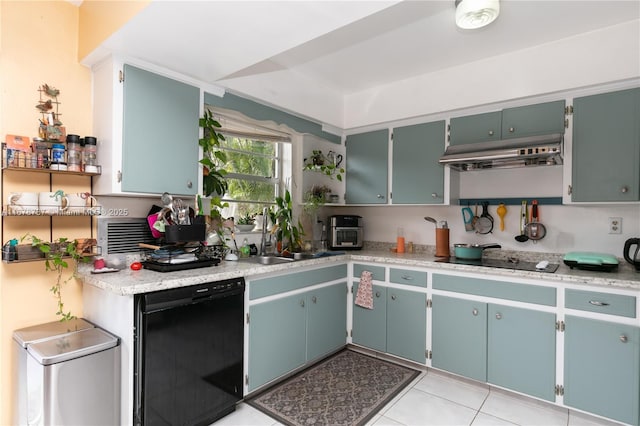 kitchen with black appliances, sink, and light tile patterned flooring