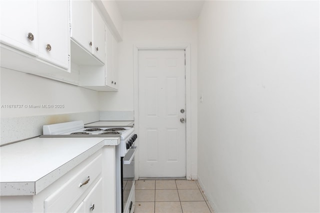 laundry room with light tile patterned floors