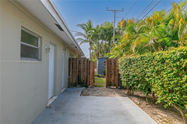 view of property exterior with a patio