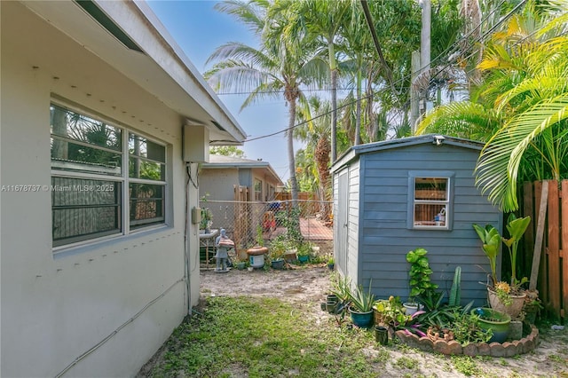 view of home's exterior with a shed