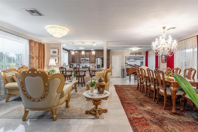 tiled dining area with an inviting chandelier and ornamental molding