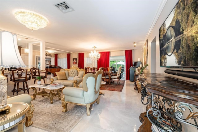 living room with crown molding and an inviting chandelier