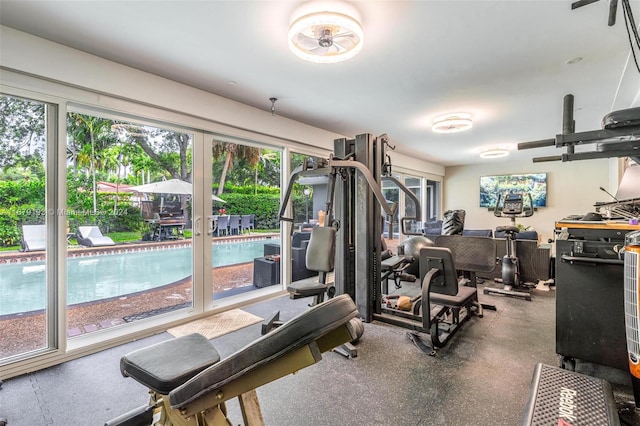 exercise room featuring ceiling fan