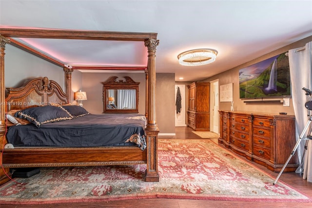 bedroom featuring hardwood / wood-style flooring