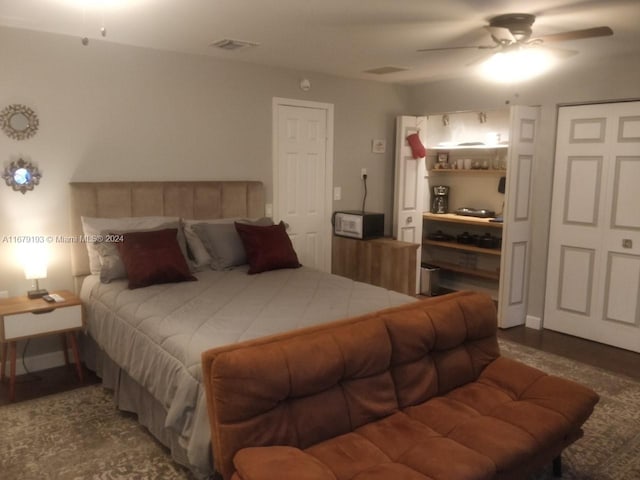 bedroom featuring hardwood / wood-style floors and ceiling fan