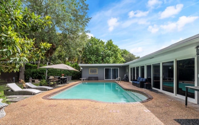 view of pool with a patio