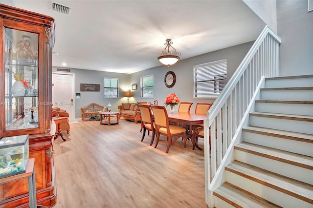 3544 W 94th St, Hialeah, FL 33018 - dining area with stairs and light wood finished floors