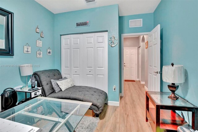 3544 W 94th St, Hialeah, FL 33018 - bedroom featuring light wood-style flooring and a closet