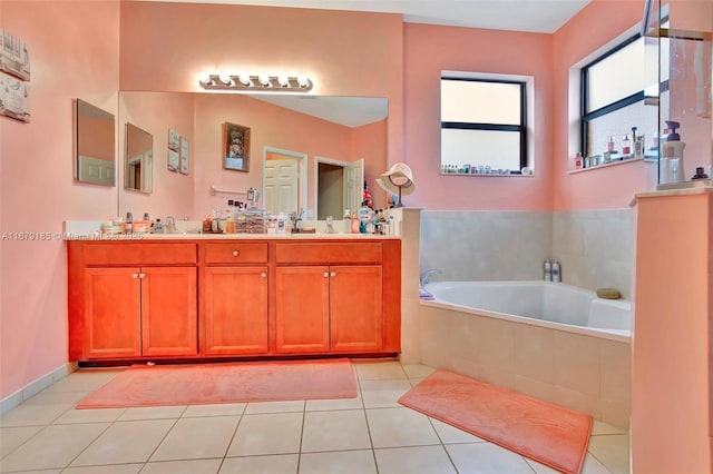 3544 W 94th St, Hialeah, FL 33018 - bathroom with a garden tub, double vanity, and tile patterned flooring