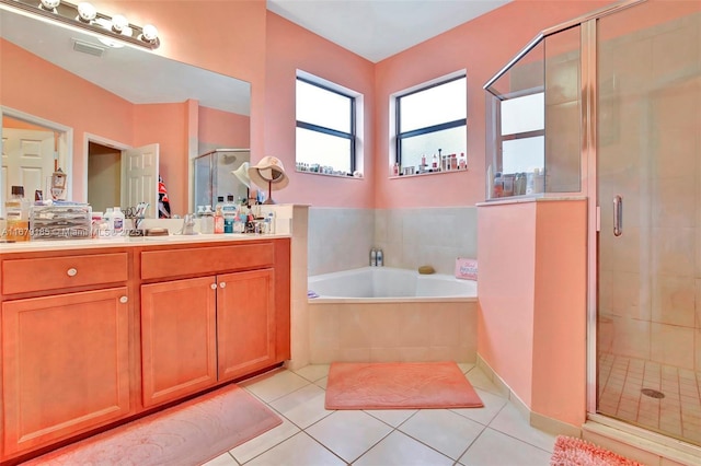 3544 W 94th St, Hialeah, FL 33018 - full bath featuring a stall shower, vanity, tile patterned floors, and a bath