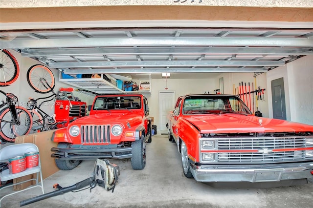3544 W 94th St, Hialeah, FL 33018 - garage featuring a garage door opener and electric panel