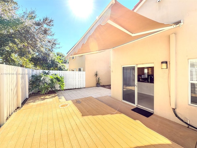 wooden deck featuring a patio