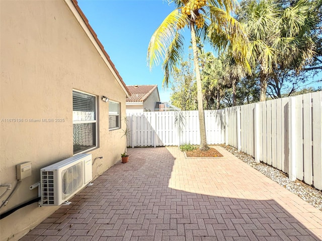 view of patio / terrace with ac unit