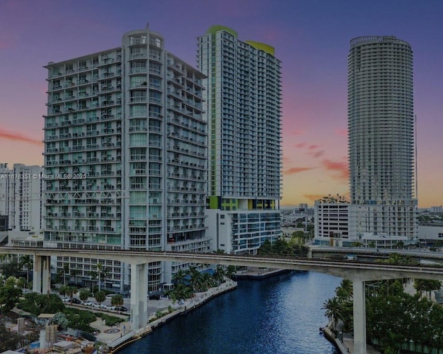 outdoor building at dusk with a water view