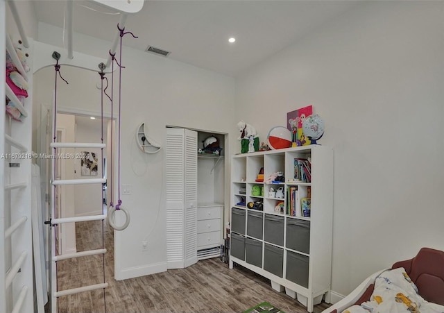 bedroom featuring hardwood / wood-style floors