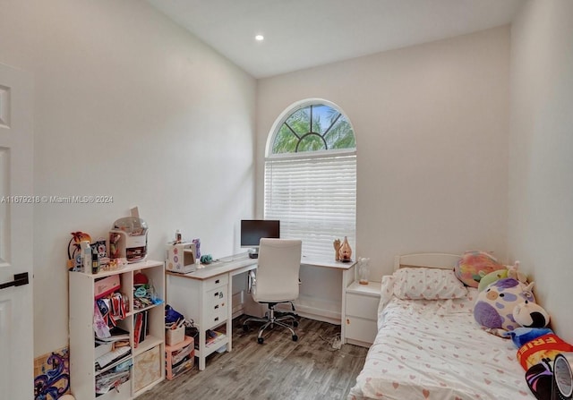 bedroom featuring light hardwood / wood-style floors