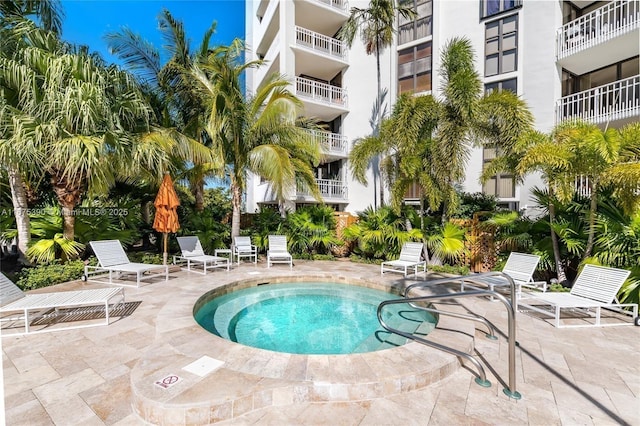 view of swimming pool featuring a patio area