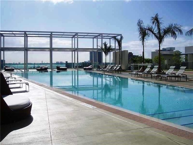 view of swimming pool featuring a patio