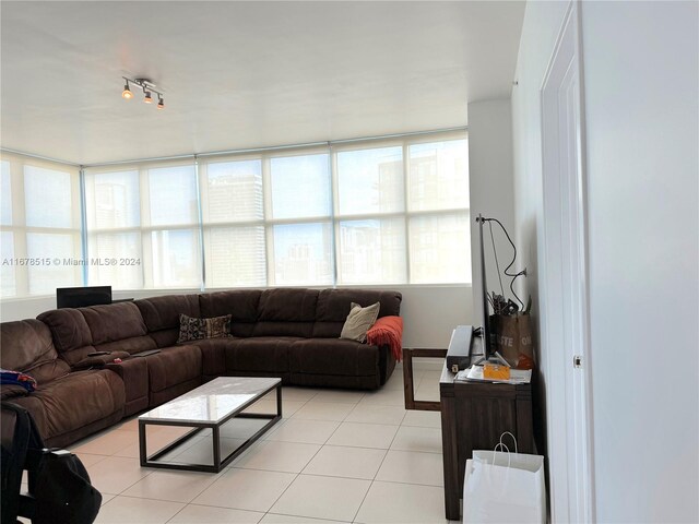 living room featuring light tile patterned floors