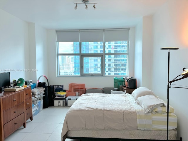 bedroom with multiple windows