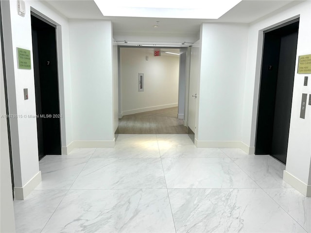 hall featuring elevator