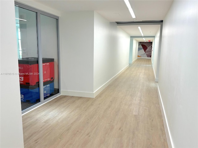 corridor featuring light hardwood / wood-style flooring