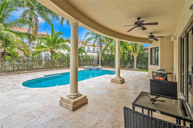 view of swimming pool with ceiling fan and a patio area