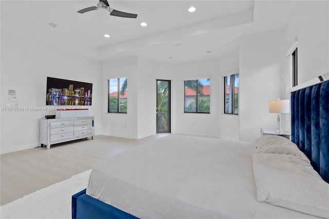 bedroom with light colored carpet and ceiling fan