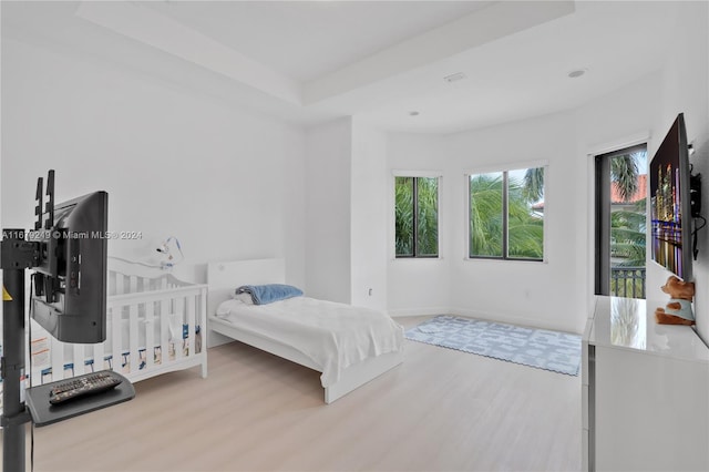 bedroom with light wood-type flooring