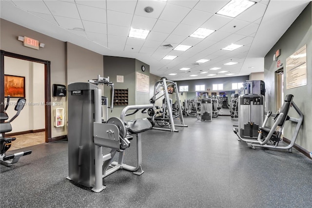 gym featuring a drop ceiling