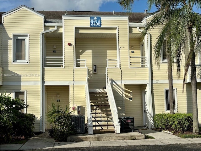 view of front facade featuring central AC unit