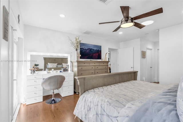 bedroom featuring wood-type flooring and ceiling fan