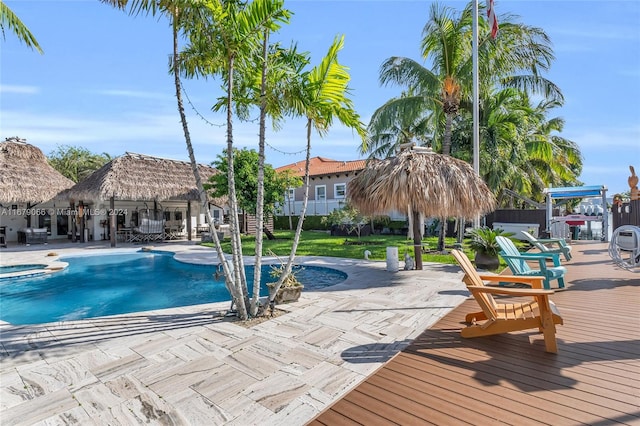 view of swimming pool with a gazebo, a patio area, and a lawn