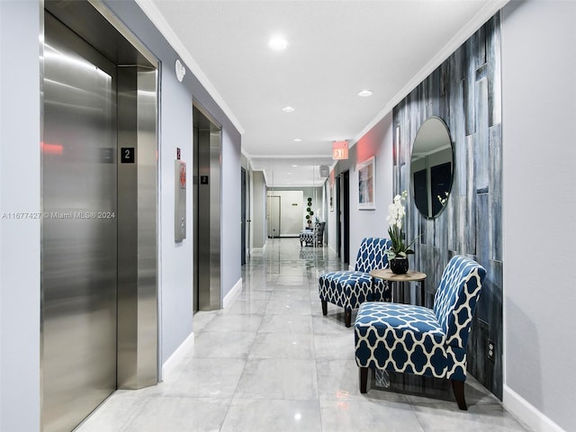 hallway with ornamental molding and elevator