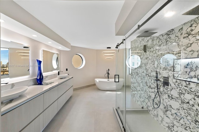 bathroom featuring vanity, tile walls, and separate shower and tub