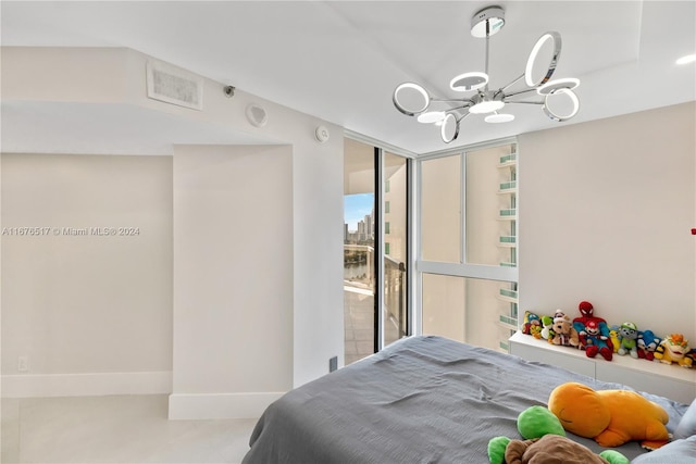 bedroom with an inviting chandelier