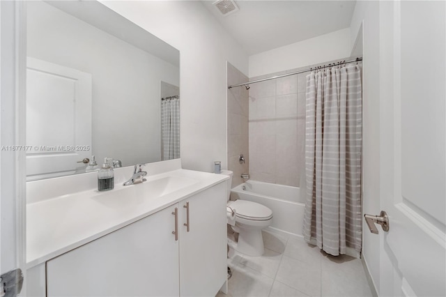 bathroom featuring visible vents, toilet, shower / bath combo, tile patterned flooring, and vanity