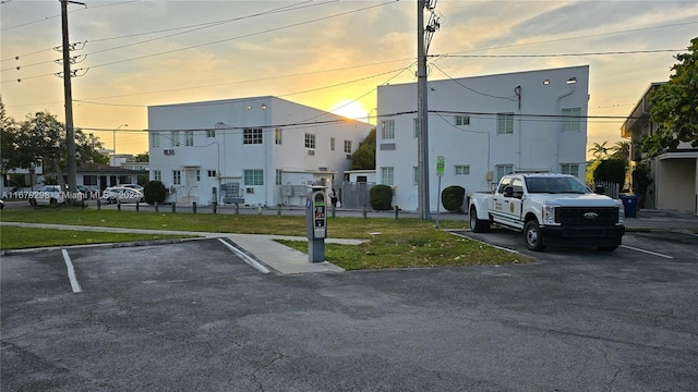 view of outdoor building at dusk