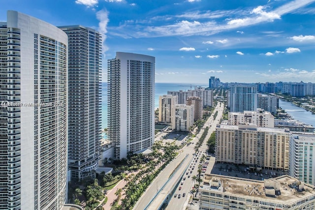 property's view of city featuring a water view