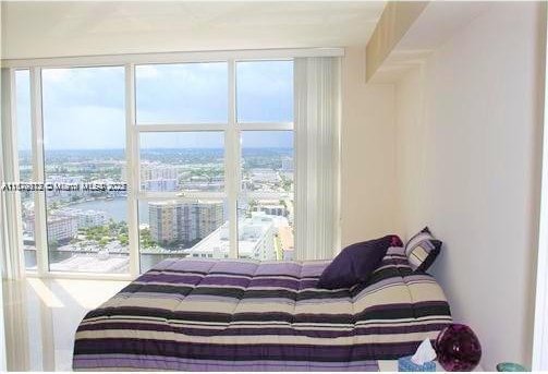 bedroom with a water view