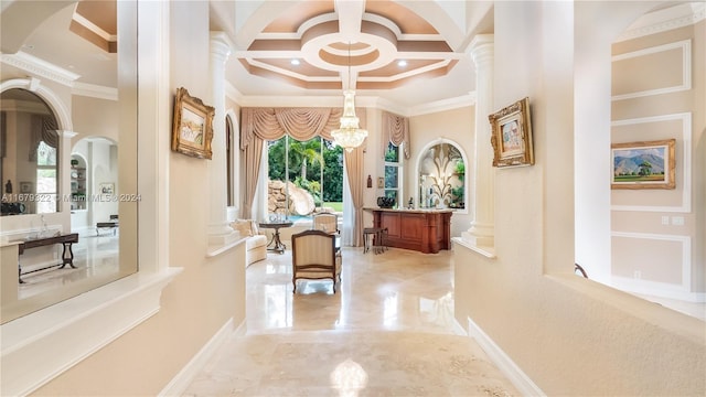 hallway featuring decorative columns, coffered ceiling, and ornamental molding