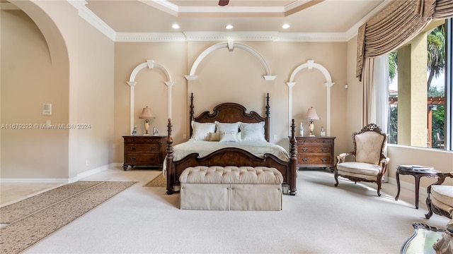 bedroom with light carpet and ornamental molding