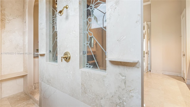 interior space with a tile shower