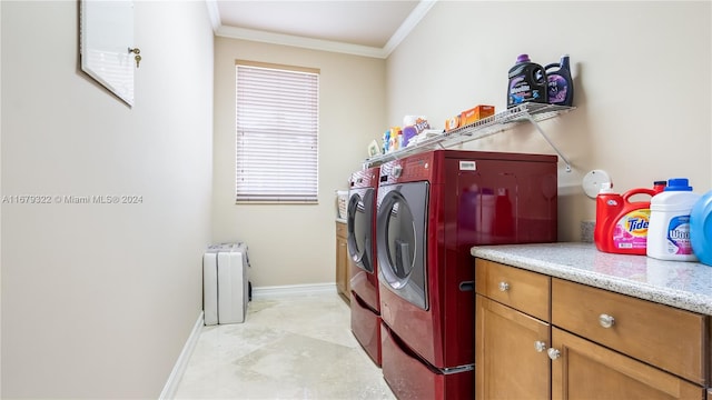 laundry room featuring ornamental molding, independent washer and dryer, cabinets, and radiator