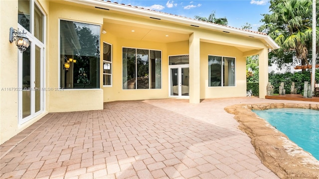 rear view of house with a patio area